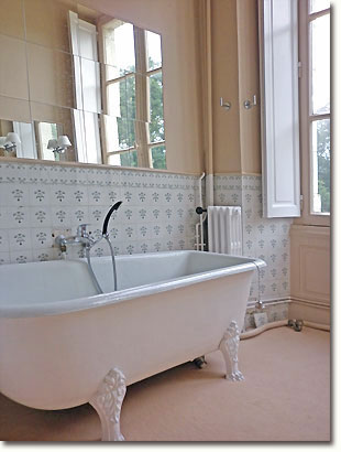 Large en suite bathroom with claw foot tub