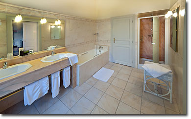 Bathroom with tub and walk-in shower